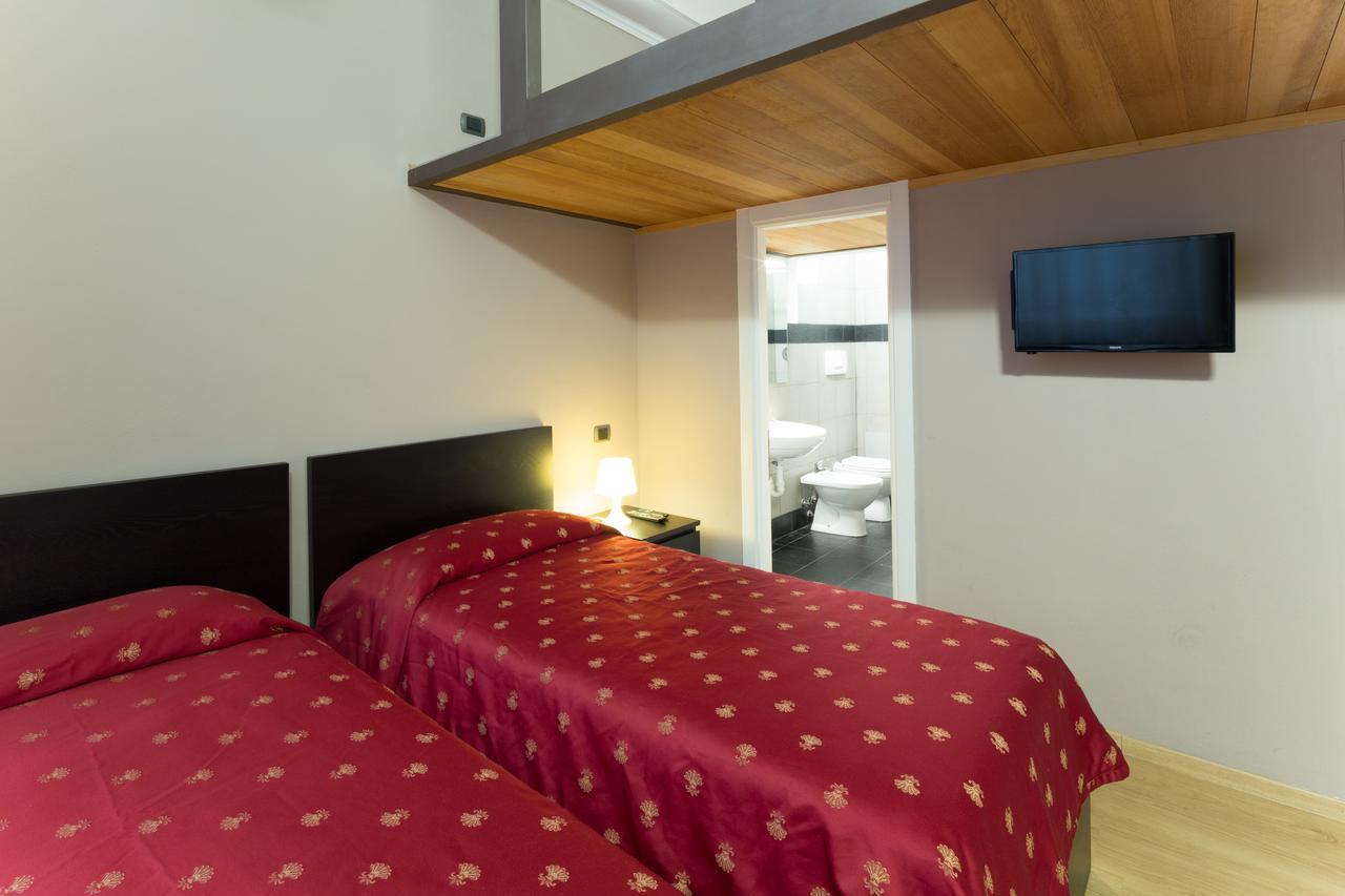 Helvetia Suite Genoa Bagian luar foto