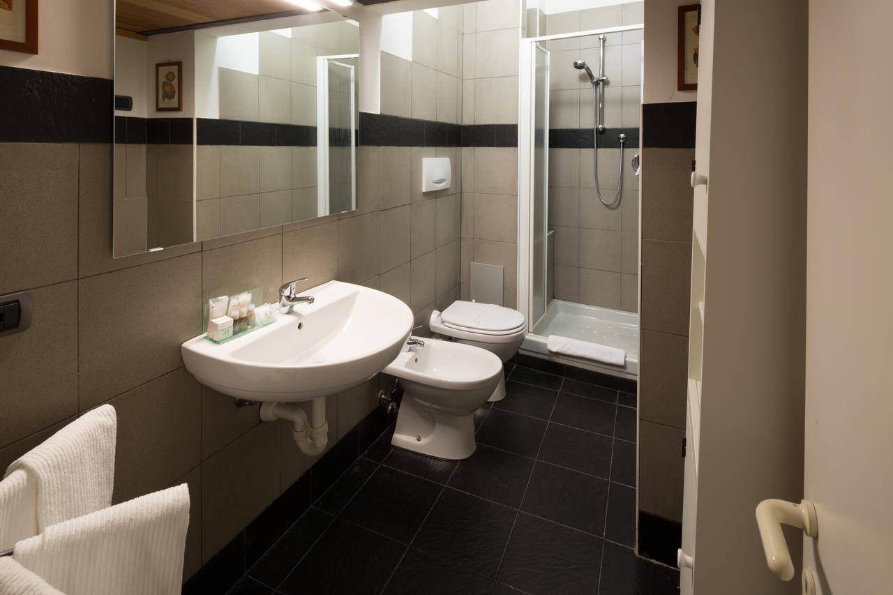 Helvetia Suite Genoa Bagian luar foto